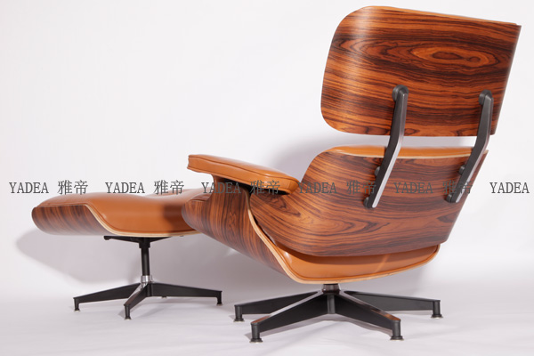橙色核桃木贴皮的伊姆斯休闲椅(Walnut Eames Lounge Chair In Orange Leather)